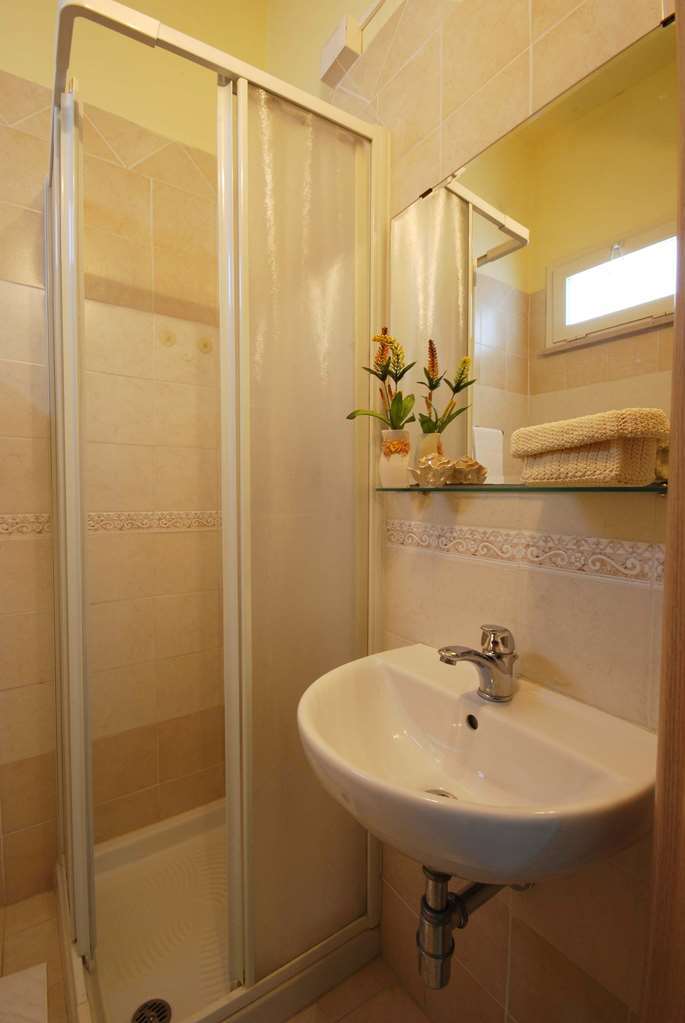 Hotel Caggiari เซนีกัลเลีย ห้อง รูปภาพ